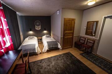 Фото номера Двухместный номер с 2 отдельными кроватями Отель Wilderness Hotel Kuusamo г. Kiviperä 8